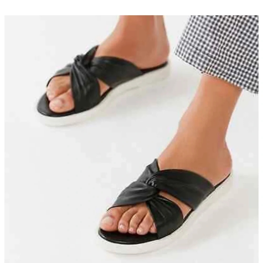Urban Outfitters UO Black and White criss crossed‎ leather rubber sandals